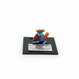 Trofeo ejecutivo alebrije chico con placa metálica grabada con logotipo corporativo para reconocimientos empresariales | Ambiente Mexicano