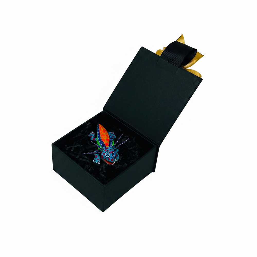 Estuche de lujo negro personalizado con placa para regalos corporativos institucionales de Ambiente Mexicano