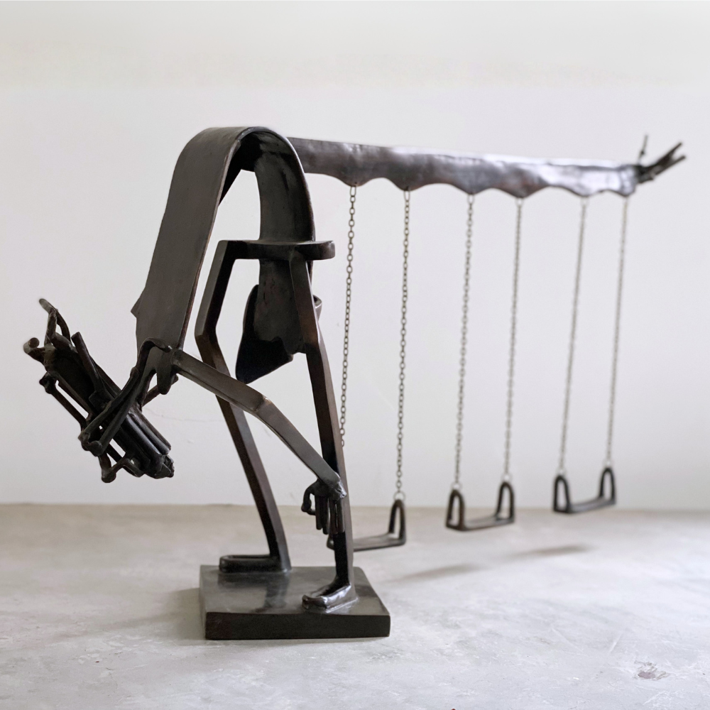 El Hombre de los Columpios — escultura en bronce certificada de Mario Zarza como regalo ejecutivo de arte mexicano para empresas -marca  Ambiente Mexicano