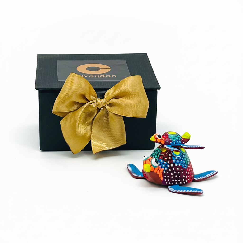 Alebrije chico de madera en estuche ejecutivo rígido diseñado para regalos empresariales premium por Ambiente Mexicano